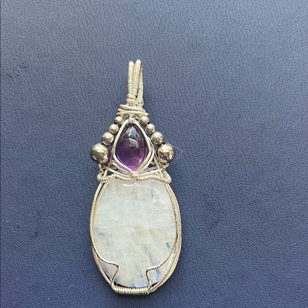 Elegant Silver and Purple Pendant